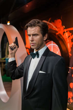 AMSTERDAM, NETHERLANDS - APRIL 25, 2017: Pierce Brosnan wax statue in Madame Tussauds museum on April 25, 2017 in Amsterdam Netherlands.のeditorial素材