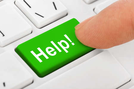 Computer notebook keyboard with Help key - technology backgroundの写真素材