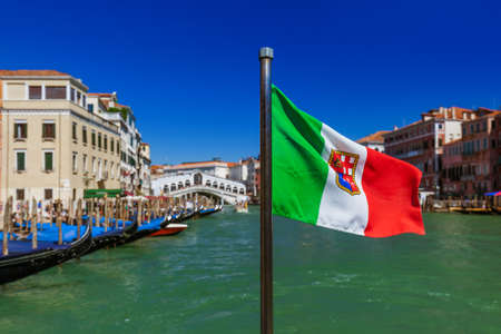 Flag and Venice cityscape - Italy - architecture backgroundの写真素材