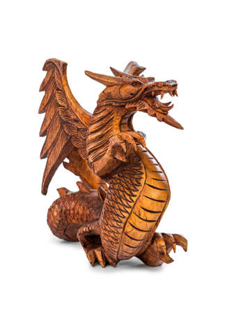 Toy wood dragon isolated on white backgroundの写真素材