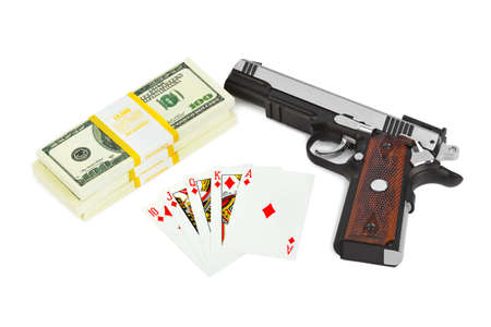 Gun money and playing cards isolated on white backgroundの写真素材