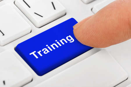 Computer notebook keyboard with Training key - technology backgroundの写真素材