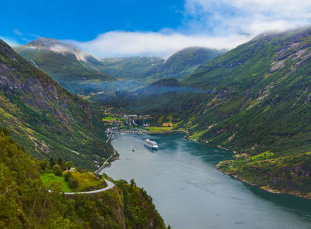 Ship in Geiranger fjord Norway - nature and travel backgroundの写真素材