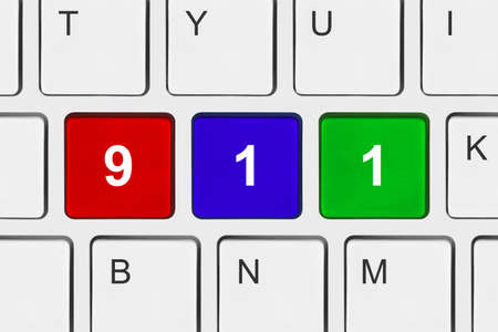 Computer keyboard with 911 key - technology backgroundの写真素材
