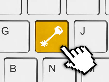 Computer keyboard with security key - technology conceptの写真素材