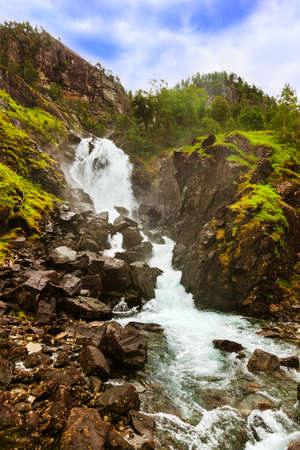 Famous waterfall Laatefossen in Hardanger Norway - nature and travel backgroundの写真素材