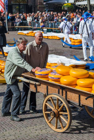 Alkmaar, Netherlands - April 28, 2017: Cheese buyers at traditional cheese market.のeditorial素材