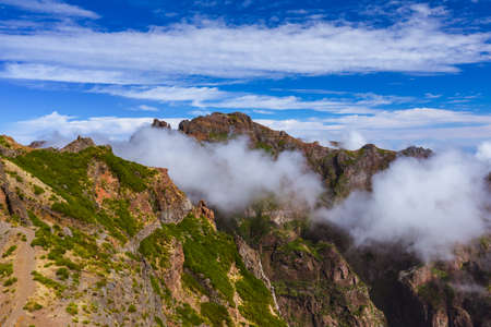 Hiking Pico do Arierio and Pico Ruivo - Madeira Portugal - travel background