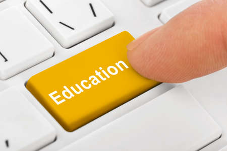 Computer notebook keyboard with Education key - technology backgroundの写真素材