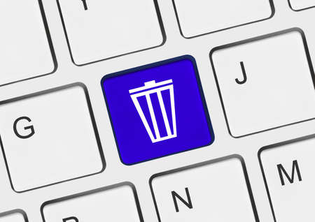 Computer keyboard with garbage key - technology conceptの写真素材