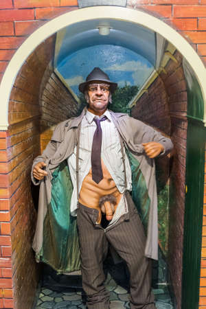 AMSTERDAM, NETHERLANDS - APRIL 25, 2017: Wax statue of exhibitionist in sex museum on April 25, 2017 in Amsterdam Netherlands.のeditorial素材