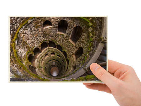 Hand and Initiation Well in Castle Quinta da Regaleira - Sintra Portugal (my photo) isolated on white backgroundのeditorial素材