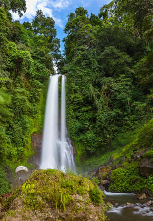 Gitgit Waterfall on Bali island Indonesia - travel and nature backgroundの写真素材