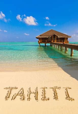 Word Tahiti on beach - concept holiday backgroundの写真素材