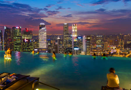 Pool on roof and Singapore city skyline - architecture and travel backgroundのeditorial素材