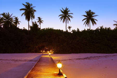 Jetty beach at sunset - Maldives vacation backgroundの写真素材