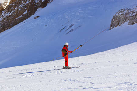 Skier at mountains ski resort Innsbruck Austria - nature and sport backgroundの写真素材