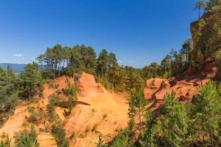Ochre hills near Roussillon in Provence France - travel and nature background