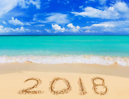 Numbers 2018 on beach - concept holiday backgroundの写真素材