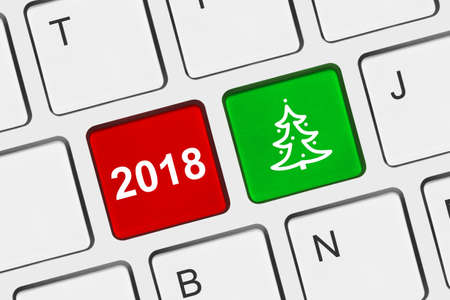 Computer keyboard with Christmas keys - holiday conceptの写真素材