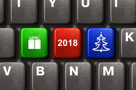 Computer keyboard with Christmas keys - holiday conceptの写真素材