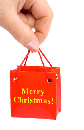 Hand with gift isolated on white backgroundの写真素材