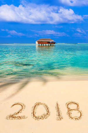 Numbers 2018 on beach - concept holiday backgroundの写真素材