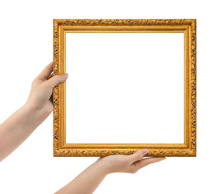 Wooden picture frame in hands isolated on white background