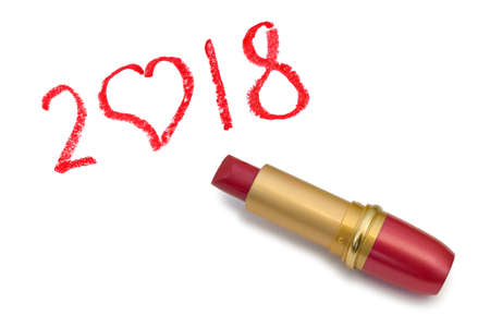 Lipstick and 2018 isolated on white background