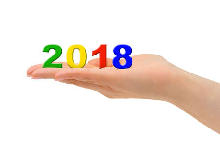 Numbers 2018 in hand isolated on white backgroundの写真素材