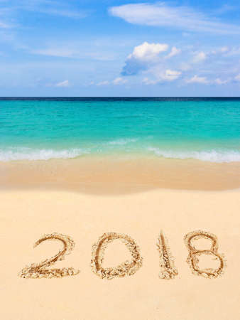 Numbers 2018 on beach - concept holiday backgroundの写真素材