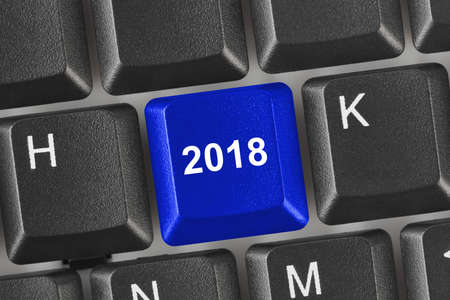 Computer keyboard with 2018 key - holiday concept