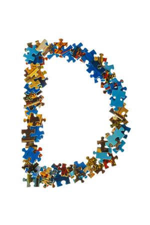 Letter D made of puzzle pieces isolated on white backgroundの写真素材