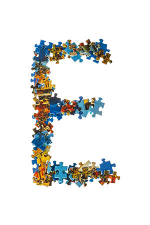 Letter E made of puzzle pieces isolated on white backgroundの写真素材