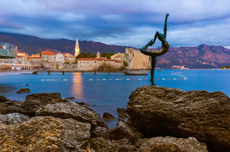 Dancer statue and Old Town in Budva Montenegro - architecture travel backgroundの写真素材