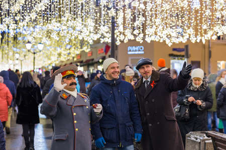 Moscow, Russia - January 05, 2018: People are photographed with actors in the role of Stalin and Lenin.のeditorial素材
