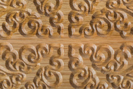 Abstract carved pattern on wood background