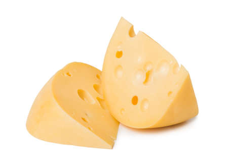 Slices of cheese isolated on white backgroundの写真素材