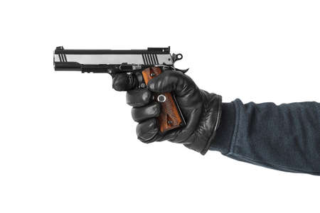 Hand with pistol isolated on white backgroundの写真素材