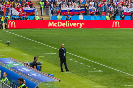 Moscow, Russia - June 14, 2018: Coach of Russian team Stanislav Cherchesov on the stadium Luzhniki at the opening match of the Football World Cup in Russia 2018.のeditorial素材