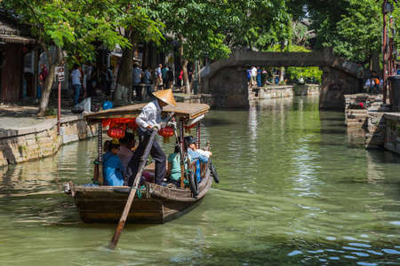Shanghai, China - May 23, 2018: Boat cruise on the canal in Zhujiajiao water town.のeditorial素材