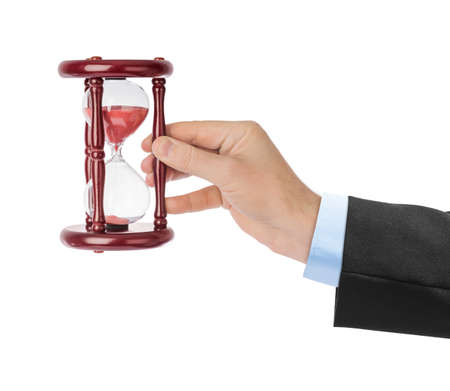 Hand with hourglass isolated on white background