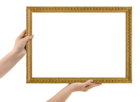 Wooden picture frame in hands isolated on white background