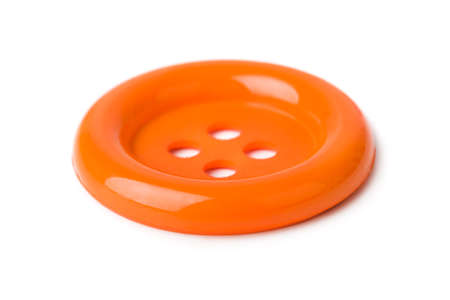 Orange button isolated on white background