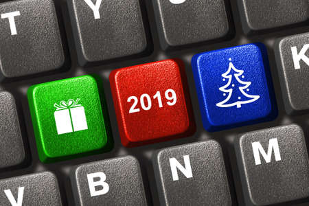 Computer keyboard with Christmas keys - holiday conceptの写真素材
