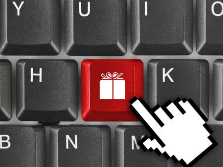 Computer keyboard with gift key - business background