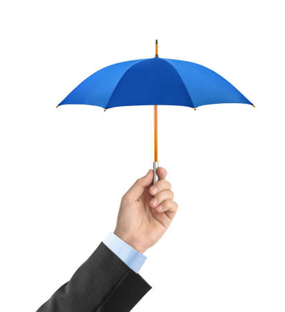 Hand with small umbrella isolated on white backgroundの写真素材