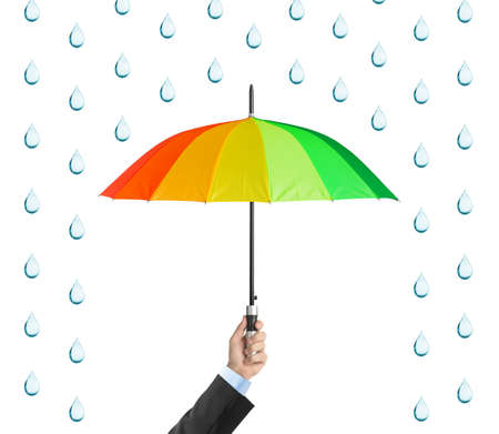 Hand with umbrella isolated on white backgroundの写真素材