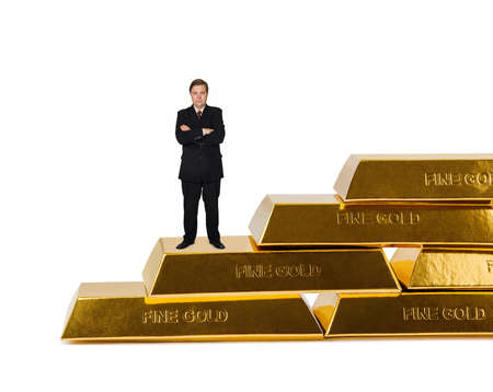 Businessman and stairs made of gold bars isolated on white backgroundの写真素材