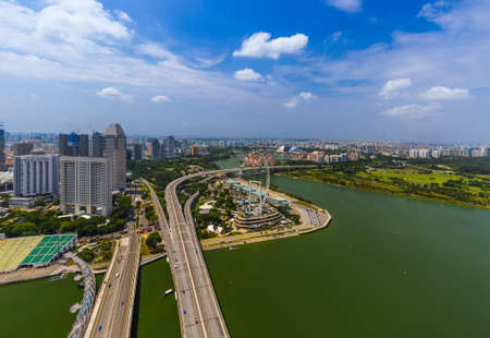 SINGAPORE - APRIL 14: Singapore city skyline and Marina Bay on April 14, 2016 in Singapore.のeditorial素材